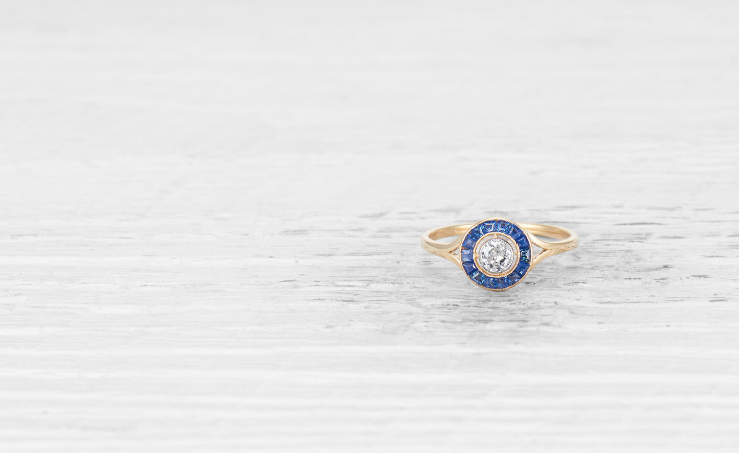 .20 CARAT ART DECO DIAMOND AND SAPPHIRE TARGET RING