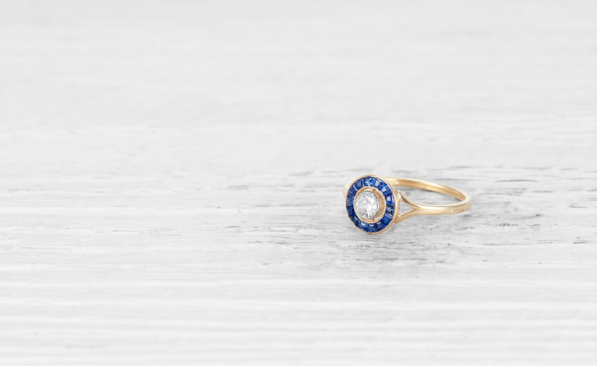 .20 CARAT ART DECO DIAMOND AND SAPPHIRE TARGET RING