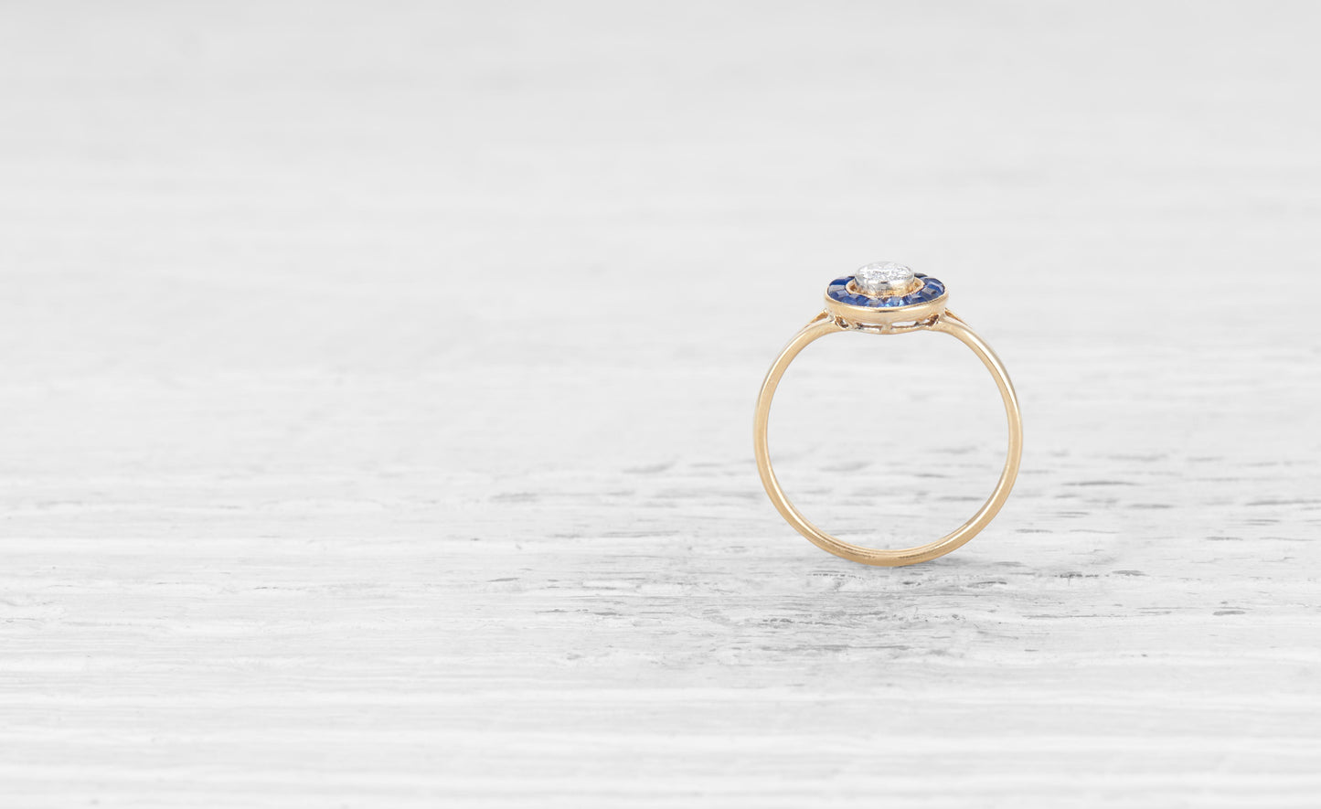 .20 CARAT ART DECO DIAMOND AND SAPPHIRE TARGET RING
