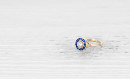.20 CARAT ART DECO DIAMOND AND SAPPHIRE TARGET RING